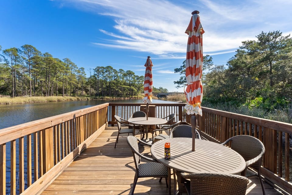 Enjoy outdoor dining and lounging under vibrant umbrellas.
