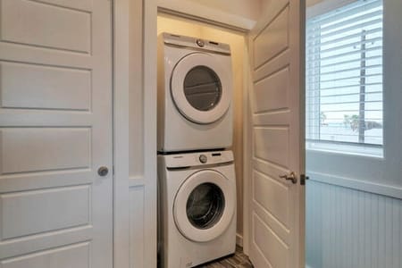 Stacked washer & dryer at your convenience. (Seas Your Dreams)