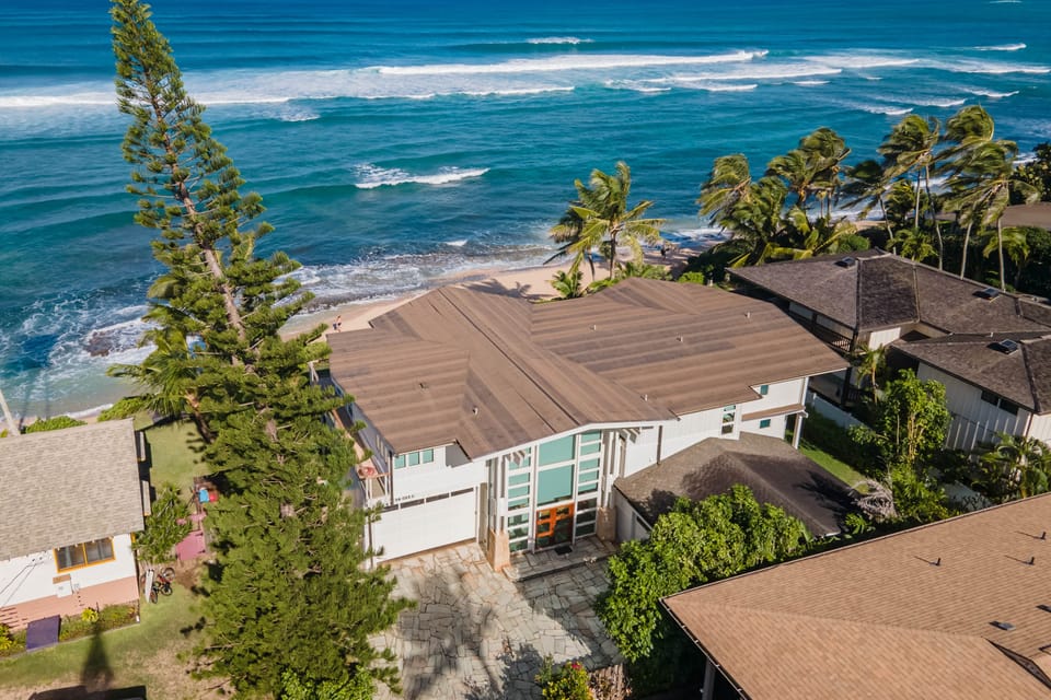 A chef's dream kitchen with top-of-the-line appliances and stunning ocean views.