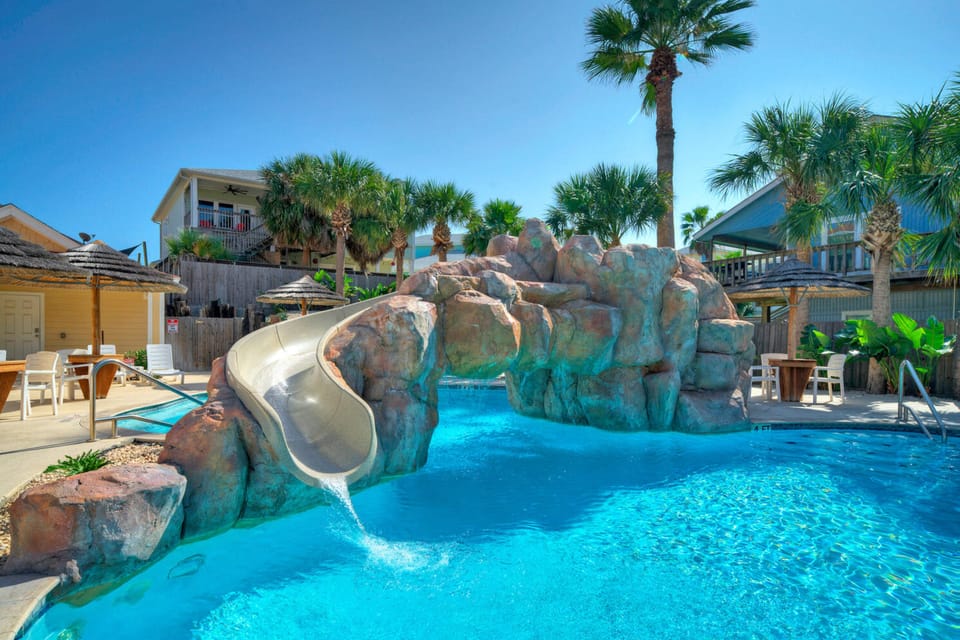 Stunning resort-style community pool with a waterslide!