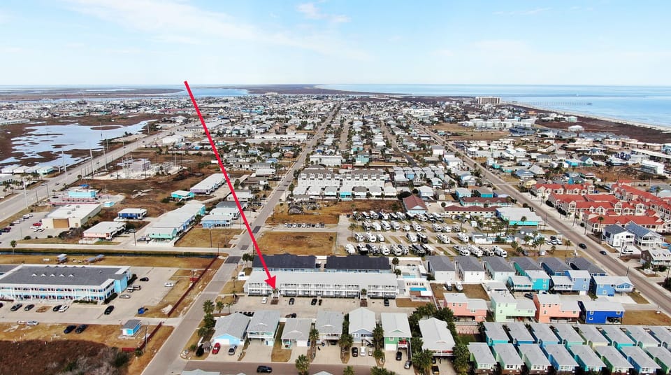 Get a bird’s-eye view of the neighborhood, with an arrow highlighting the perfect spot where your getaway awaits.