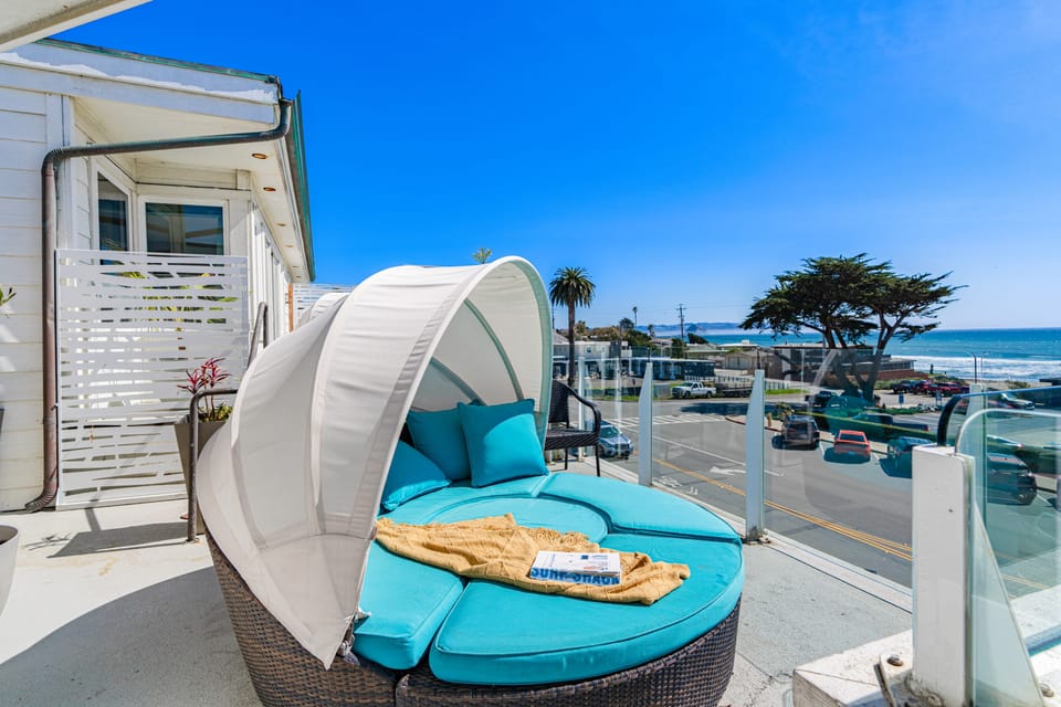 Step out onto the balcony and soak in the fresh air—your perfect spot to relax and unwind! (Cayucan Bungalow 330)