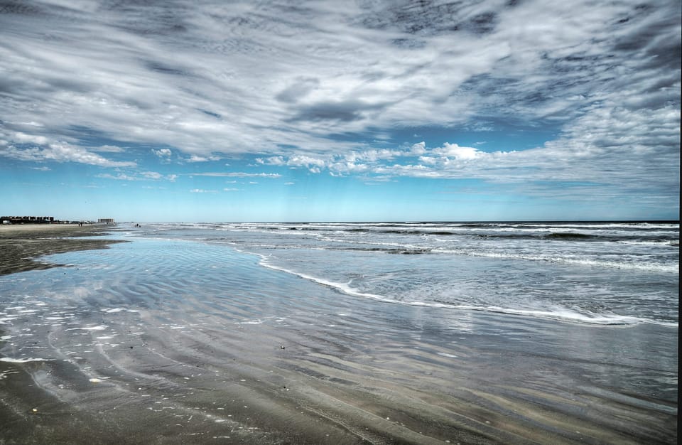 Sun-kissed sands and soothing waves.