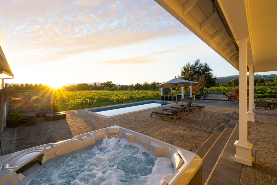 Soak and unwind in the covered hot tub with ambient lighting – comfort day or night.