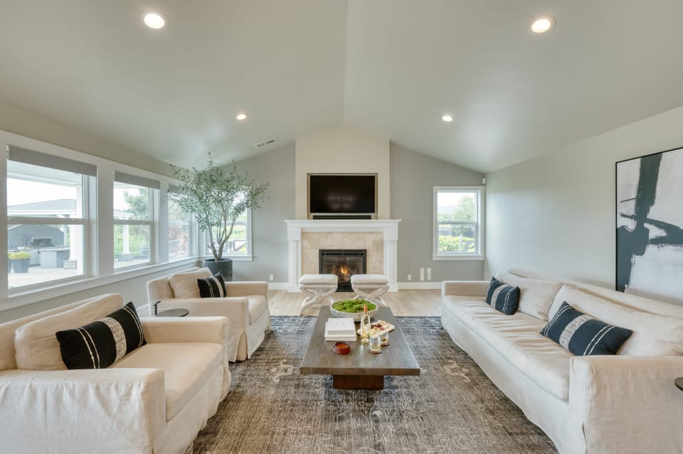 Elegant open living room with vaulted ceilings and fireplace