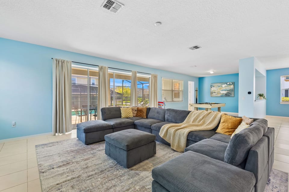 Large sectional fit for a group in the main living room.