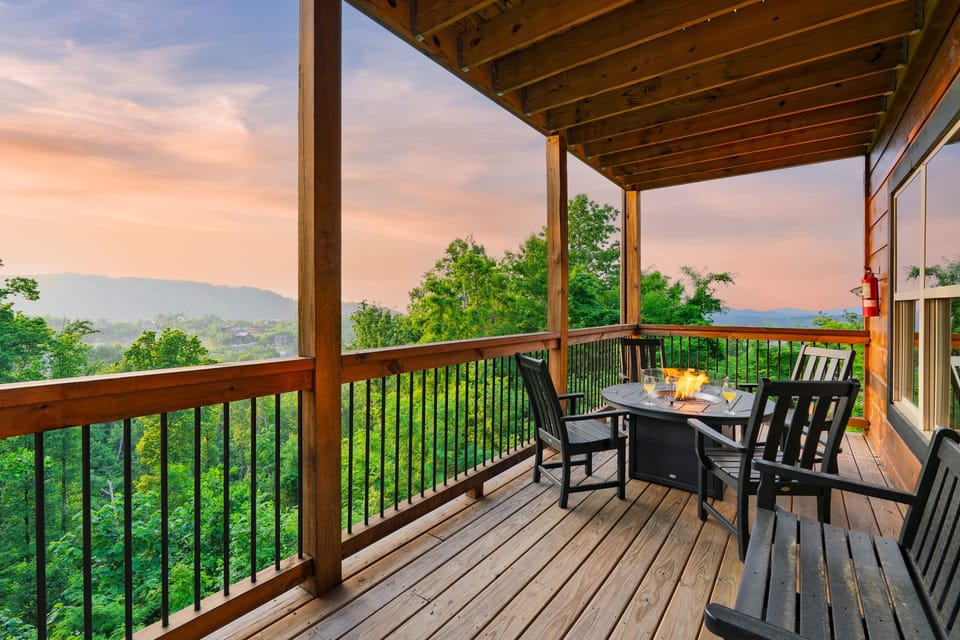 Fire table with seating on the balcony and stunning mountain views.