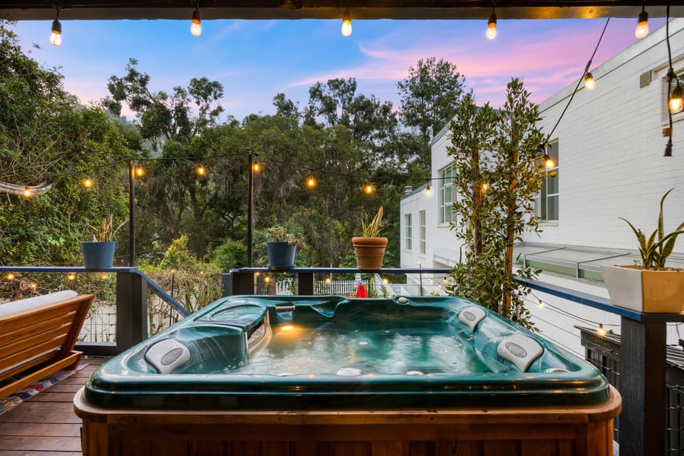 Soak in the hot tub under twinkling string lights.