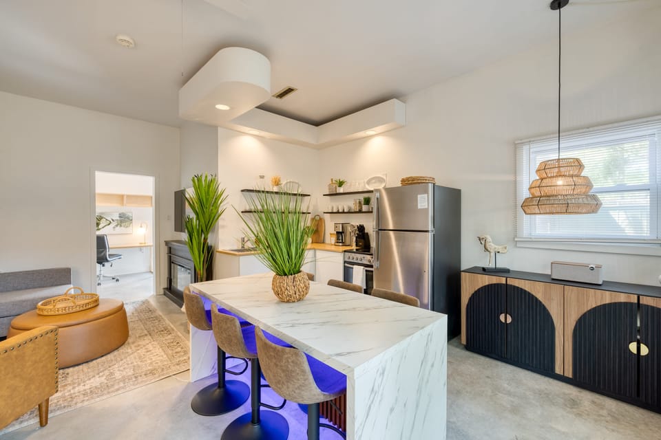 Upgrade your dining experience with a center island table and barstool seating.