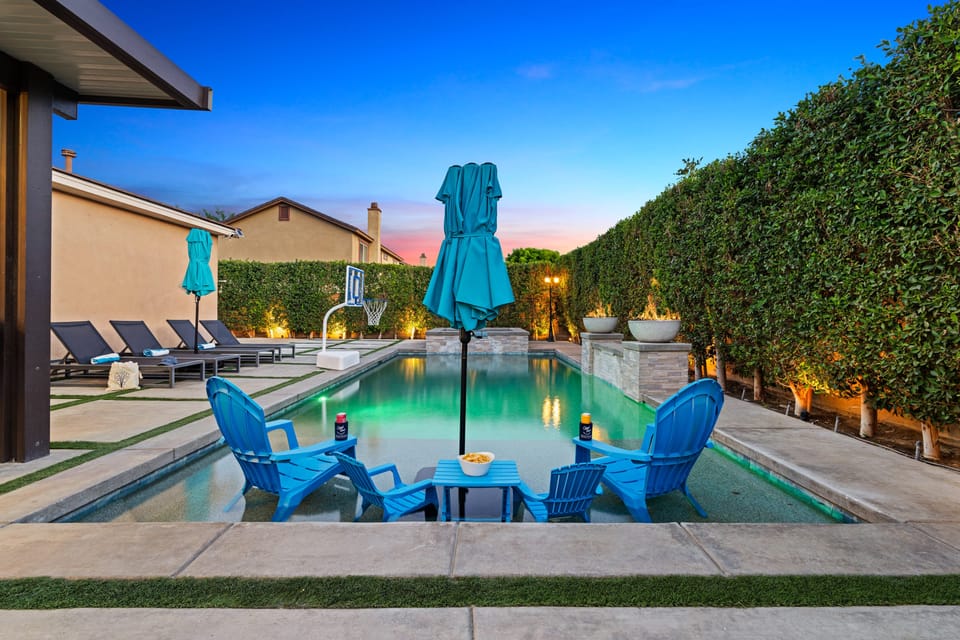 A luxurious outdoor pool and spa area.
