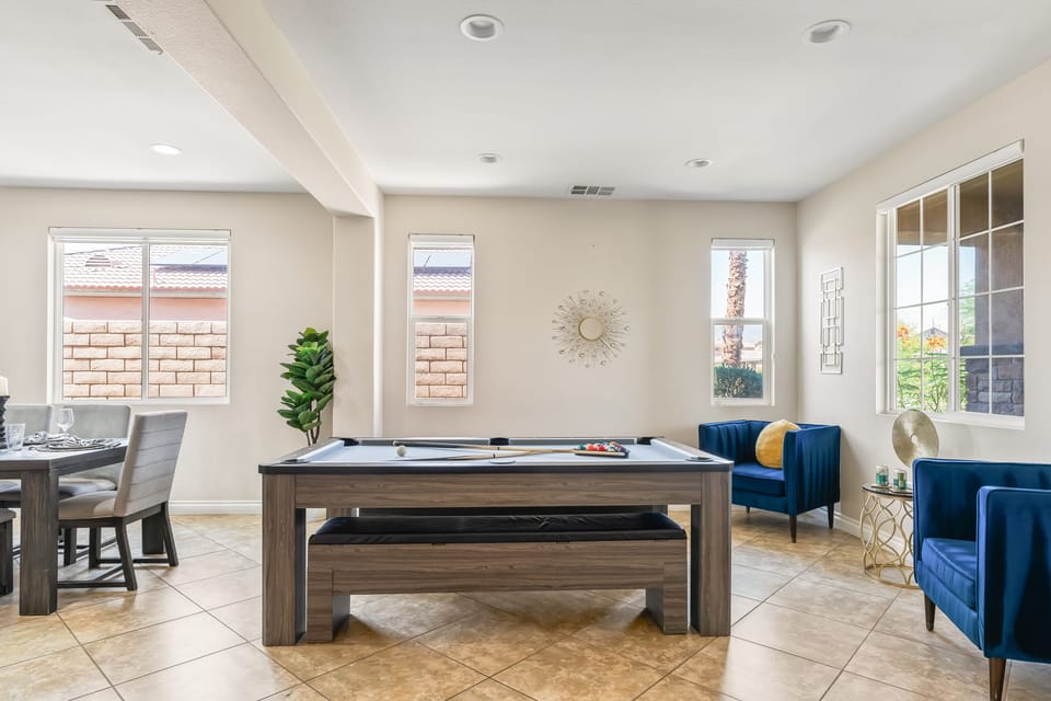 Enjoy a friendly competition around this stylish pool table.