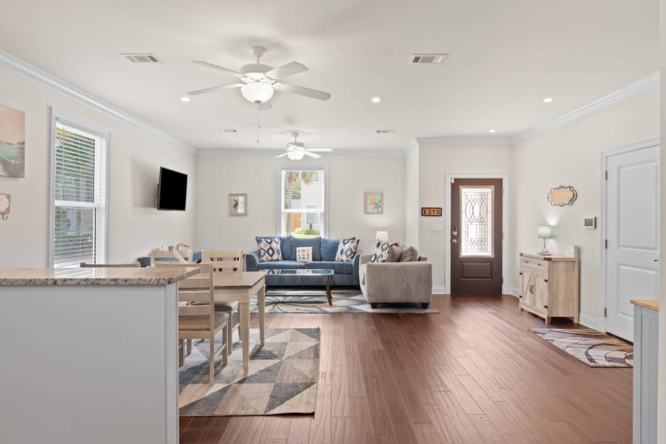 Alternate angle showing the open-plan layout and elegant finishes.