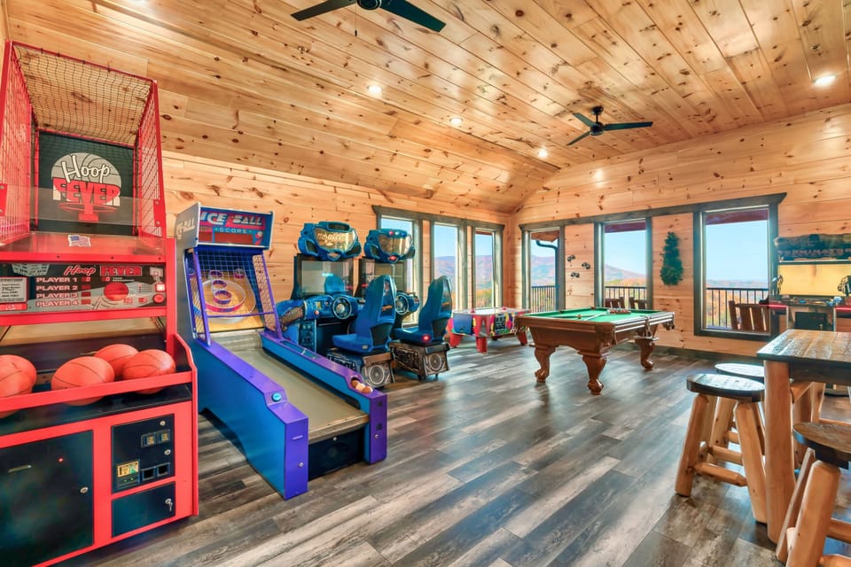 Full arcade with a pool table, air hockey, PacMan with 60 games (Galaga, Dig Dug, etc), Terminator shooting game, 2 H20 boat racing games, skeeball, and basketball arcade.
