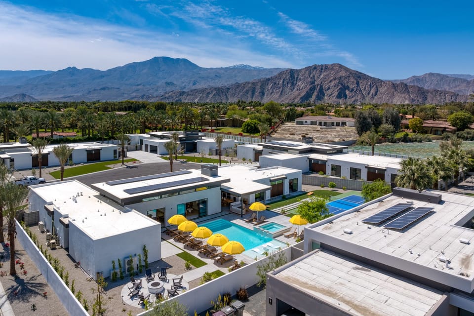 Aerial view of your pool, pickleball court, and fire pit. (Polo Villa 18)