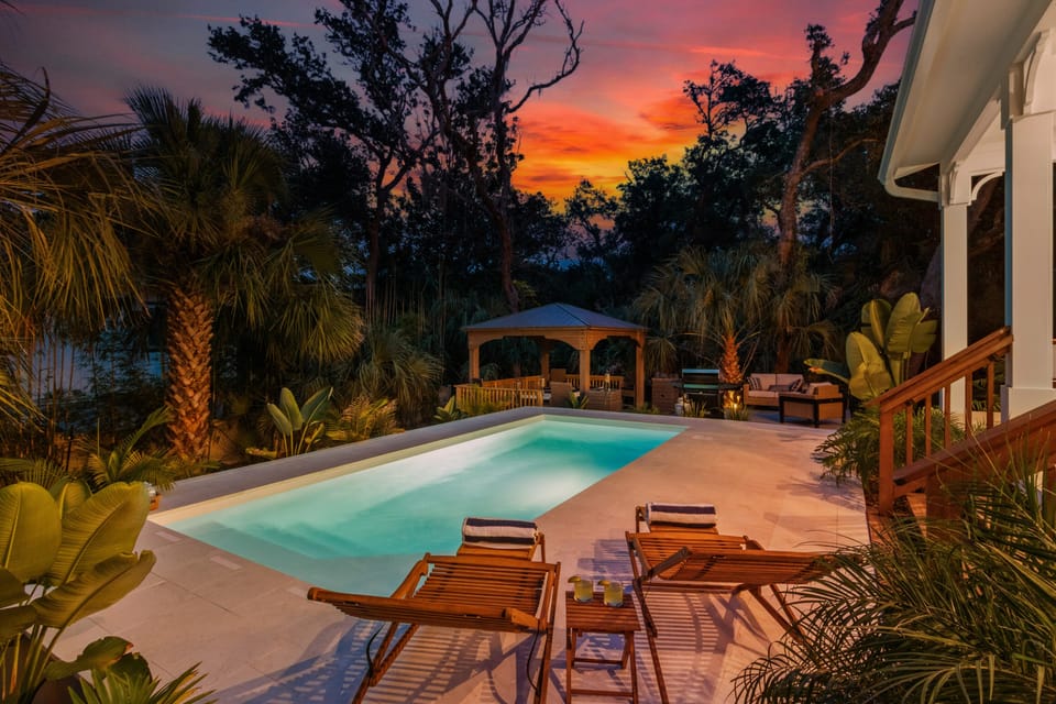 Fiery sunset illuminating the backyard deck.