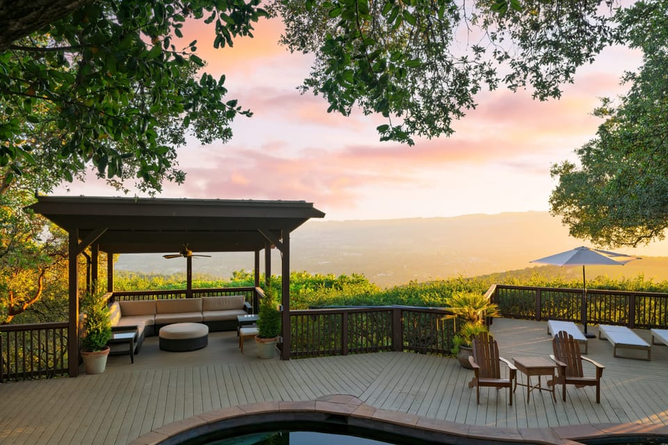 Covered outdoor lounge with panoramic views—ideal for morning coffee or evening cocktails.