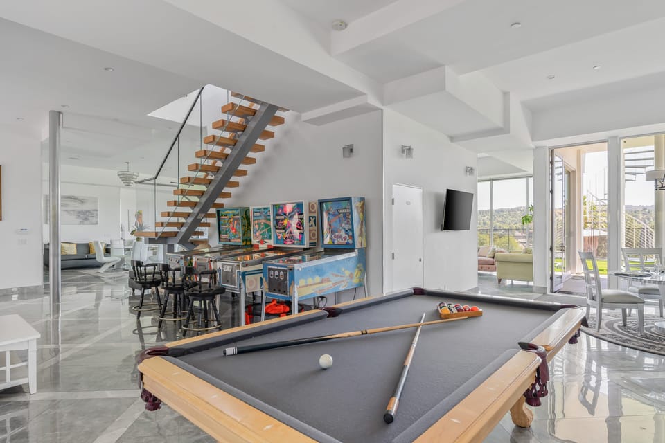 Challenge friends to a game on the classic pool table.