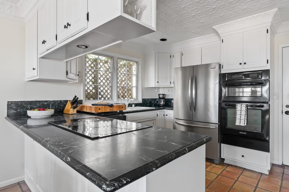 Sleek, fully equipped kitchen.