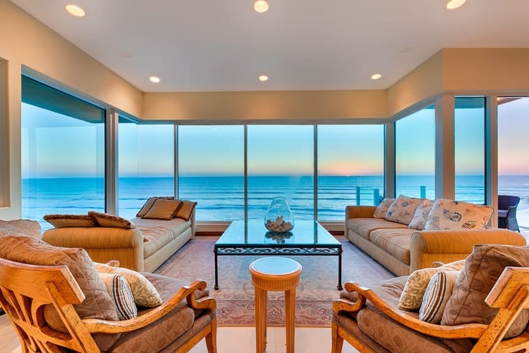 Take in ocean views from the living room, complete with cozy, comfortable seating.