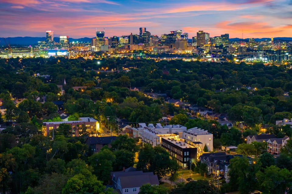 Cityscape view at sunset, highlighting the skyline.