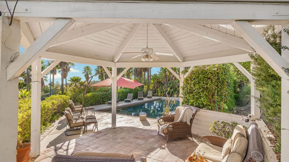 Retreat to the poolside gazebo for a relaxing afternoon. (The Tennis Ranch)