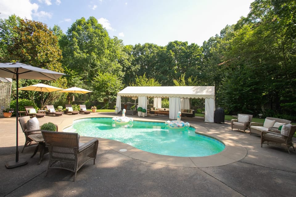 Poolside cabana and seating.