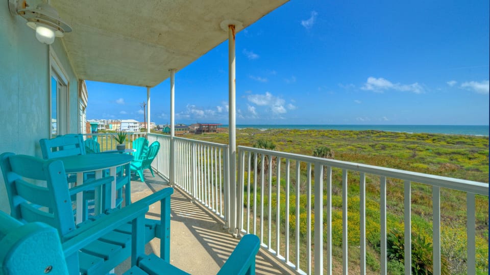 Balcony and beach view.