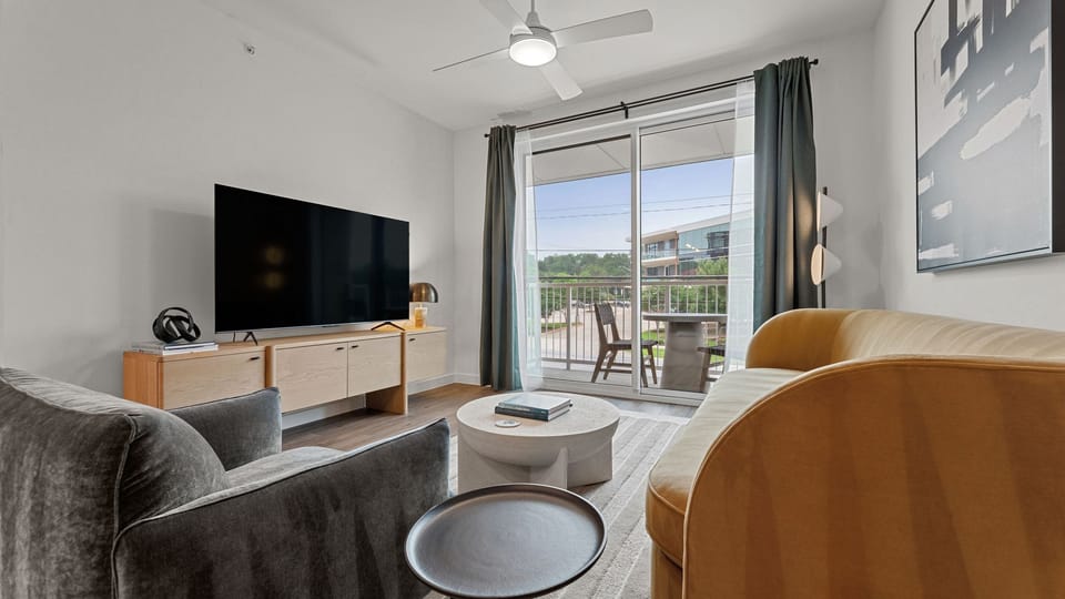 Living room with a pull-out couch for additional sleeping arrangements.