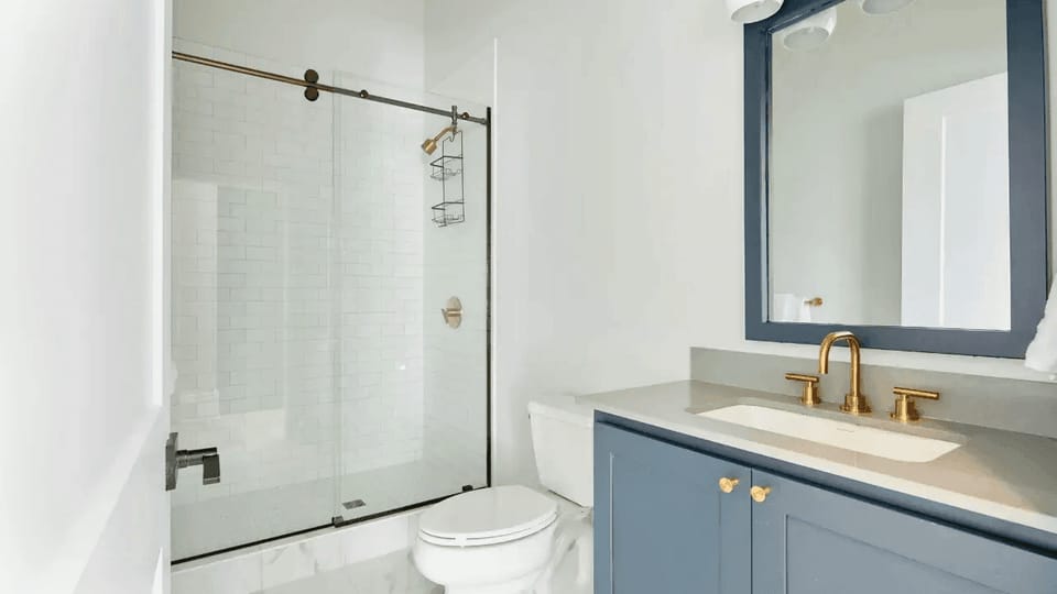 Full bathroom features a shower.