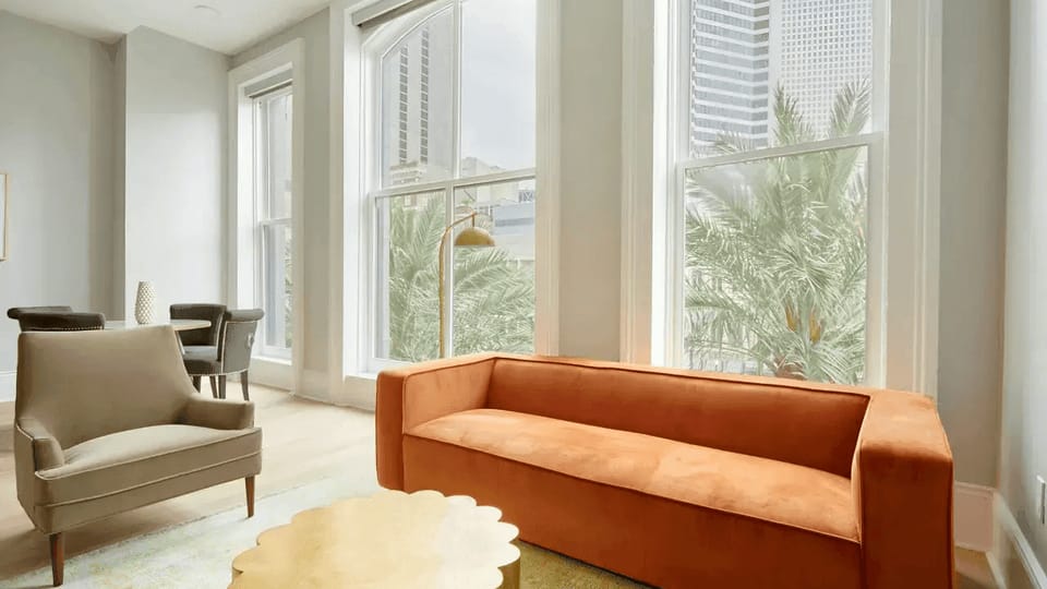 Spacious living room with comfortable seating and a TV.