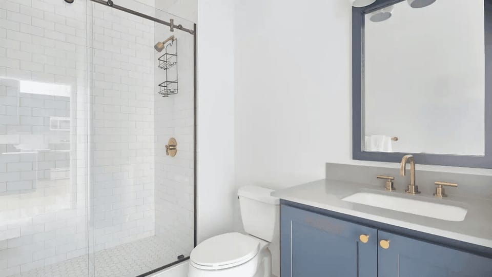 Full bathroom features a shower.