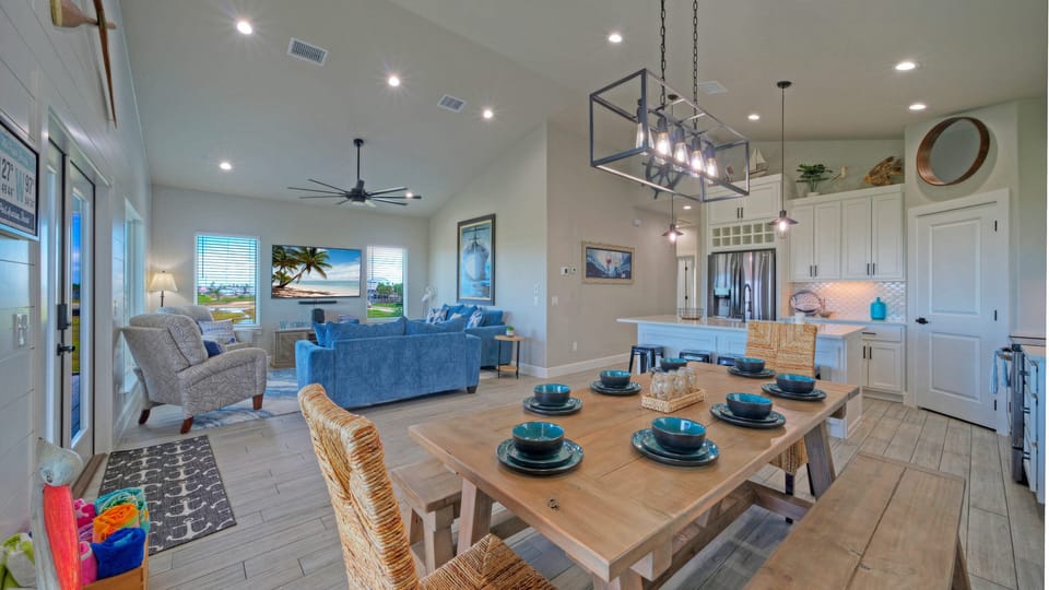Open-concept dining and living area with seating for eight.