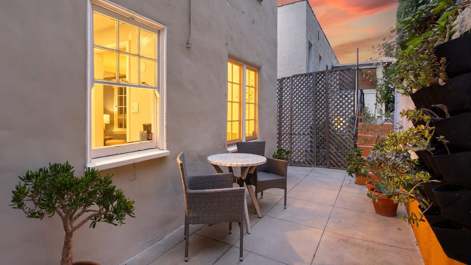 Enjoy your morning coffee or dine al fresco on the patio in the side yard.