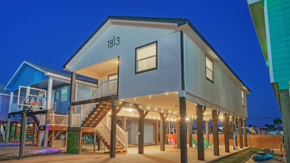 Charming exterior of your elevated beach house.