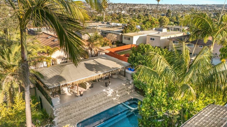 Aerial view of the property featuring the neighborhood.