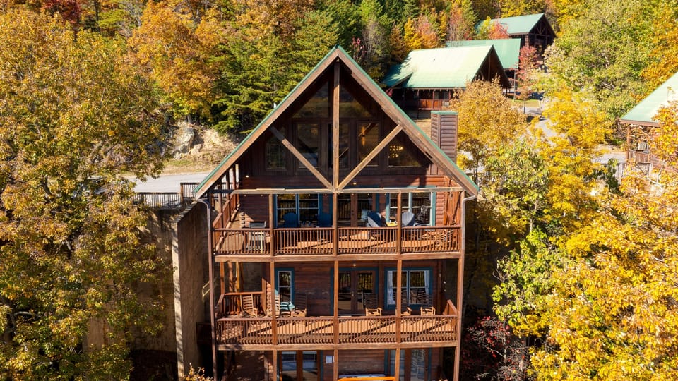 Spacious multi-level cabin with expansive decks and stunning Smoky Mountain views from every floor.
