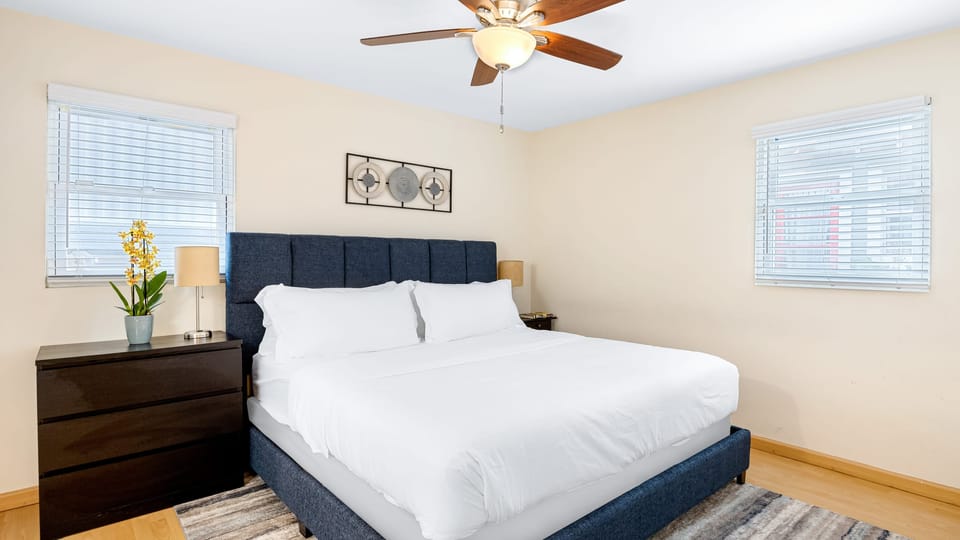 The primary bedroom features a king bed and an ensuite bathroom.