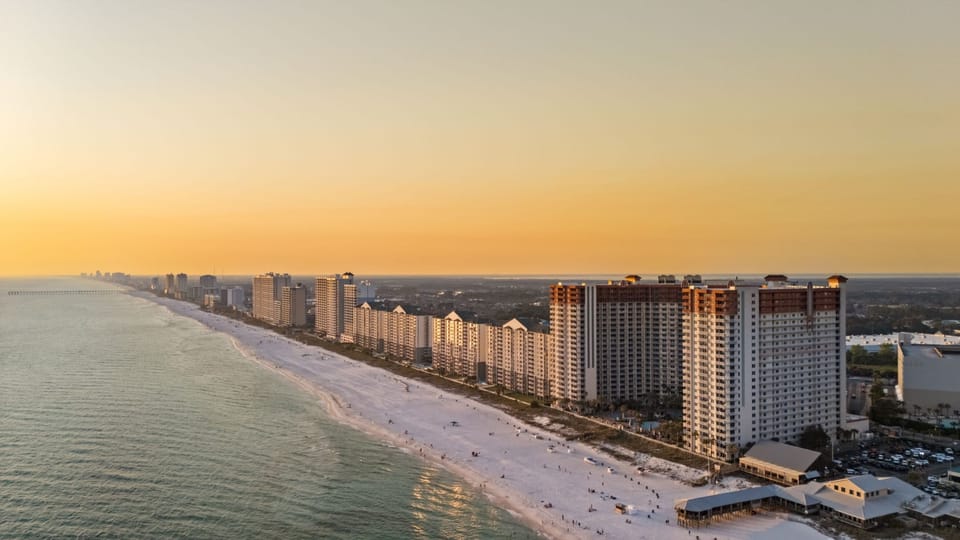 Golden-hour views over the Gulf, with the resort perched perfectly along Panama City Beach’s coastline.