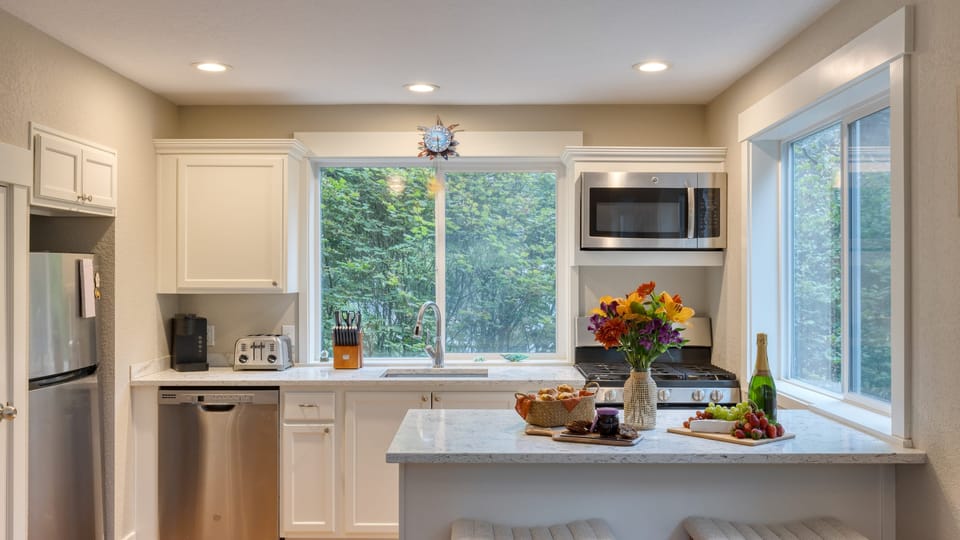 A bright, well-appointed kitchen perfect for preparing a delicious meal.
