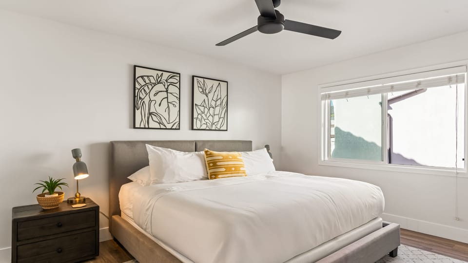 The primary bedroom features a king bed and an ensuite bathroom.