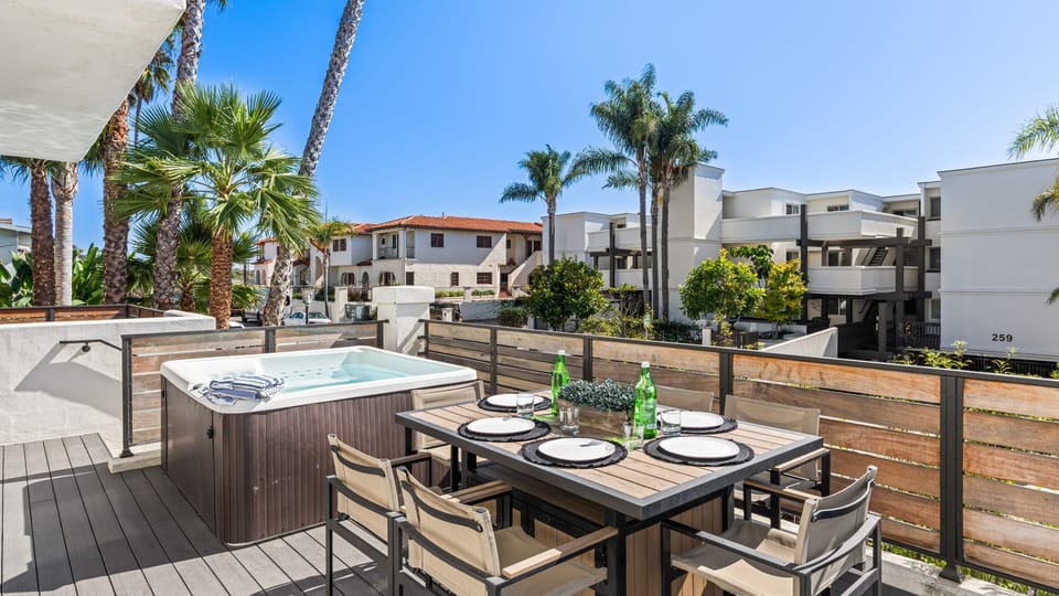 Enjoy outdoor dining on the deck, or hop in the hot tub for a rejuvenating soak.