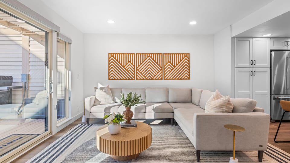 Bright living room with modern decor and natural light.