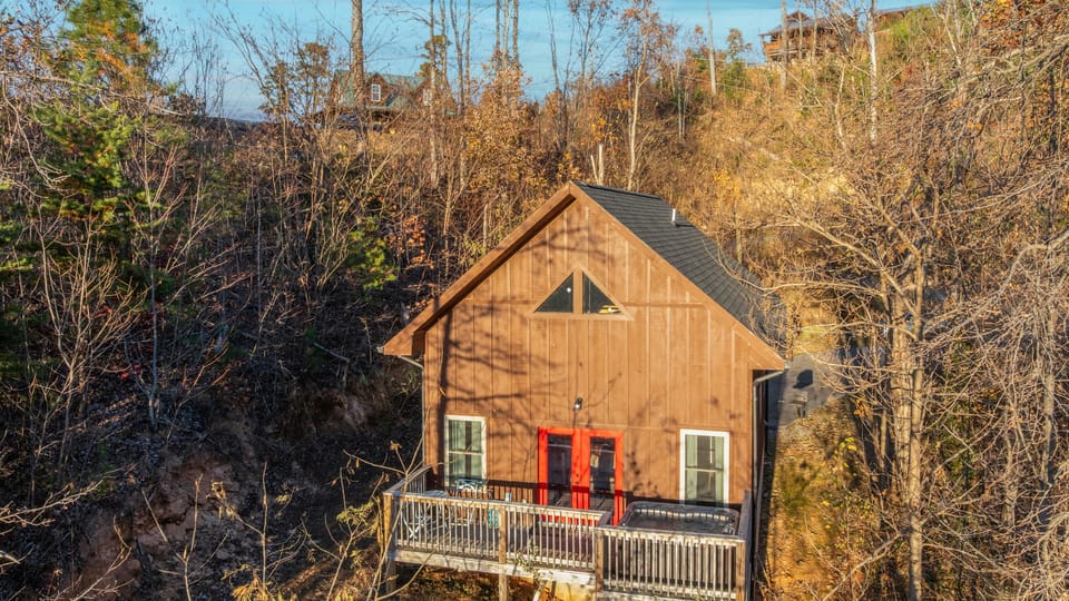 Rustic cabin charm tucked into the Smoky Mountain hillside.