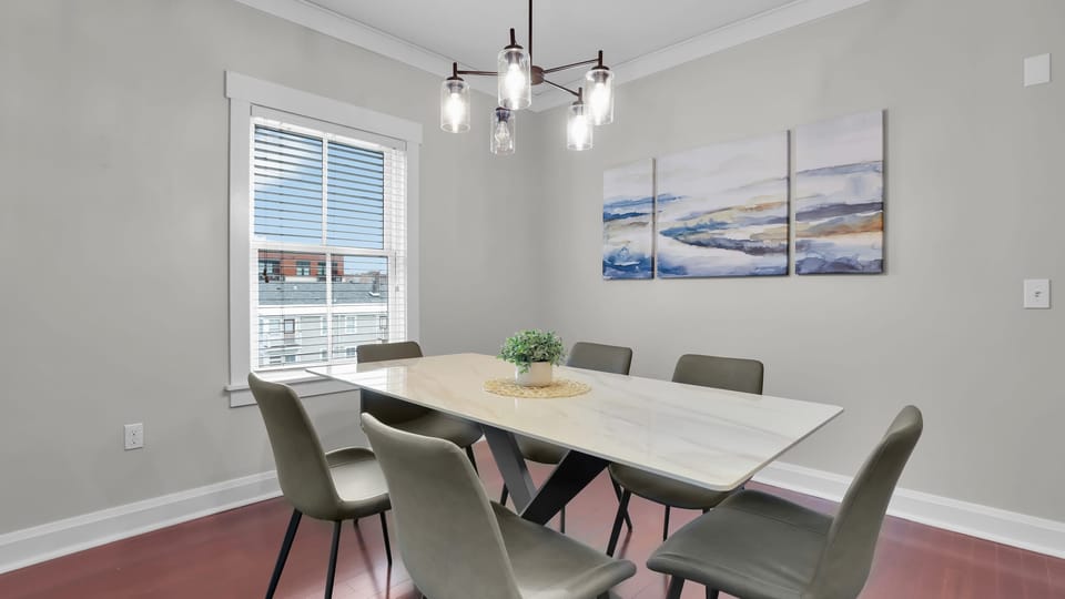 Gather for meals or unwind in this sunlit open-plan space.