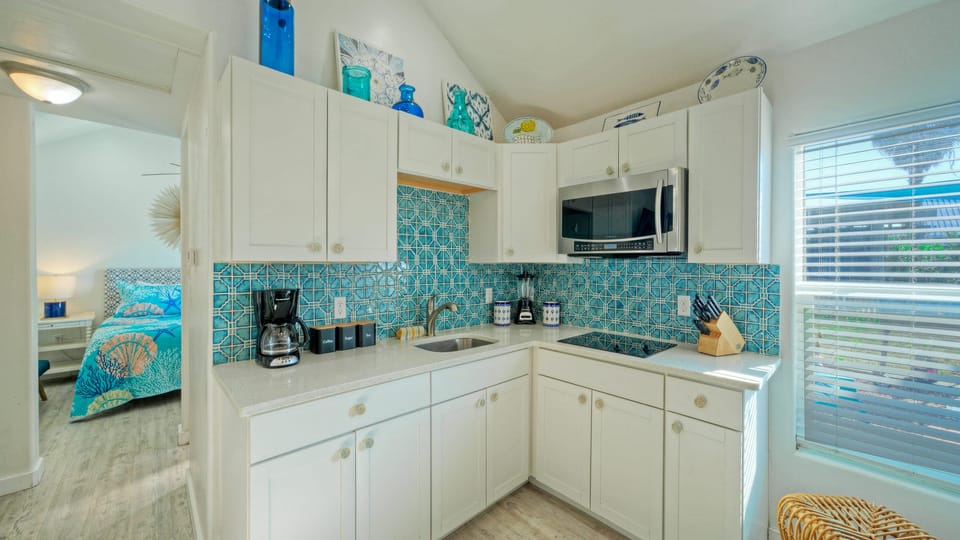Kitchenette stocked with all the necessities.
