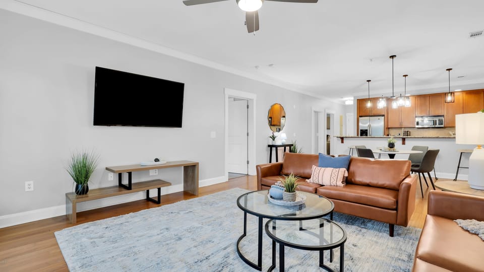 Open-concept living with stylish comfort and a seamless flow from kitchen to lounge — the heart of your stay awaits.