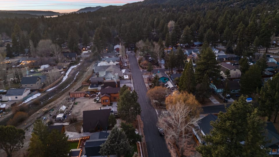 Scenic aerial view of the property nestled in the mountain town.