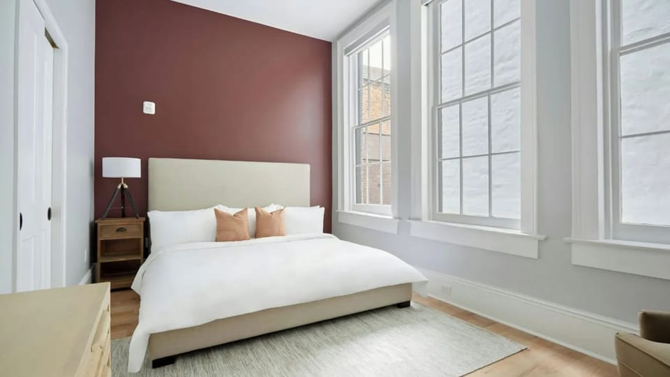 Bedroom 1 features a queen bed.