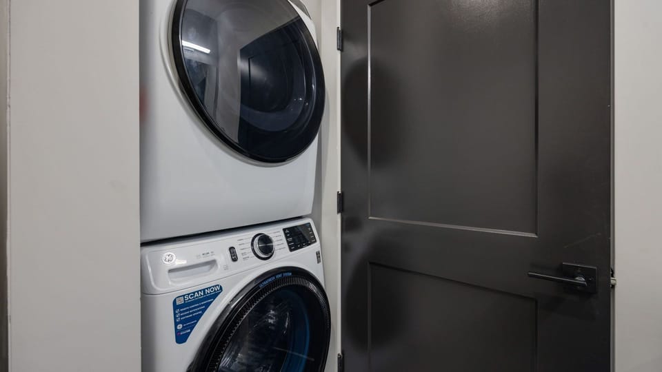 Close-up of the high-efficiency laundry units for guest convenience.