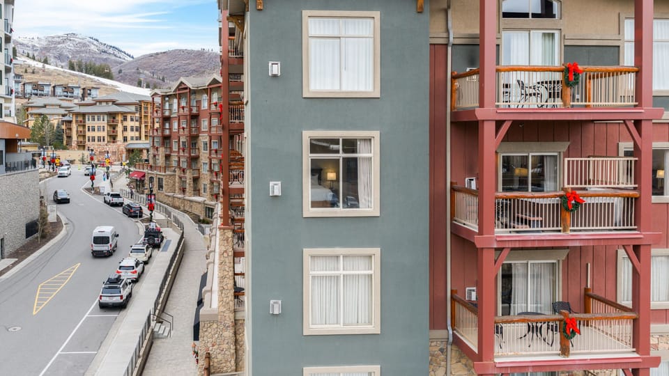 Charming mountain-style condo with private balconies.